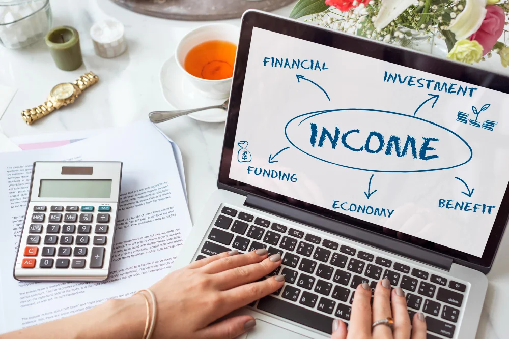 laptop with writing income